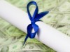 a ribbon on a scroll with cash