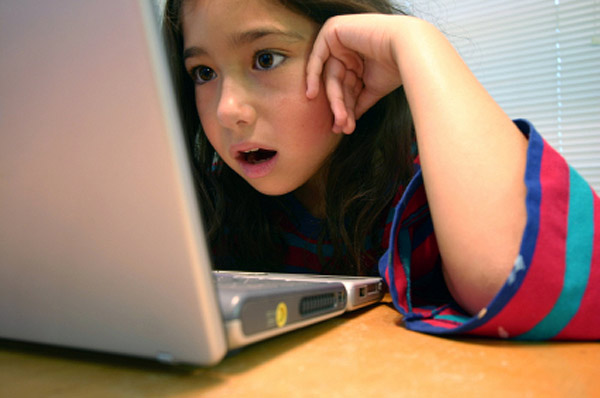 girl using a laptop