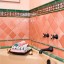 Pink and Green Tile Surrounding Bathtub