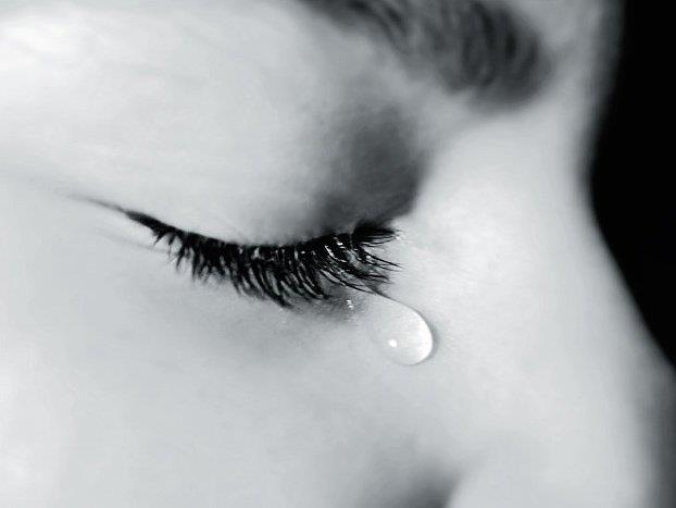 Girl shedding tears