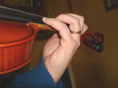 Man holding fiddle