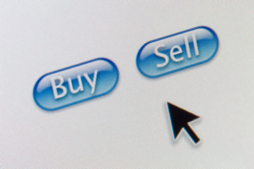 Computer cursor arrow with Buy and Sell Button