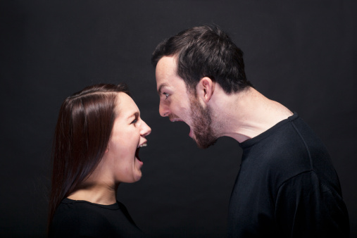 young man and woman shouting at each other