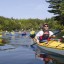 participants raise money and paddle to support the summer camp