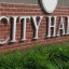 City Hall Sign Brick Wall Close Up