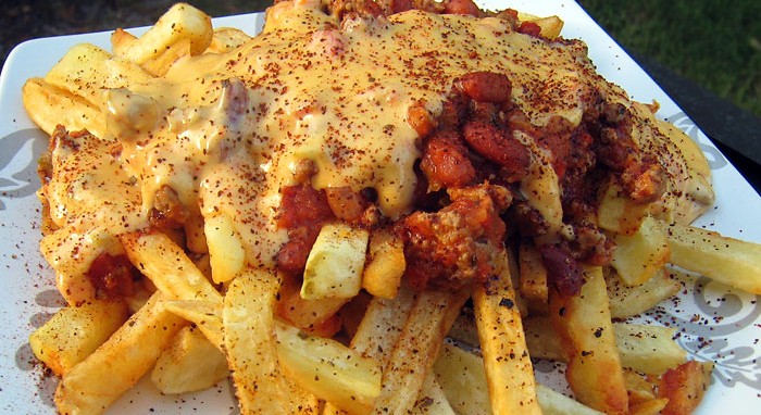 Chili cheese fries served in plate