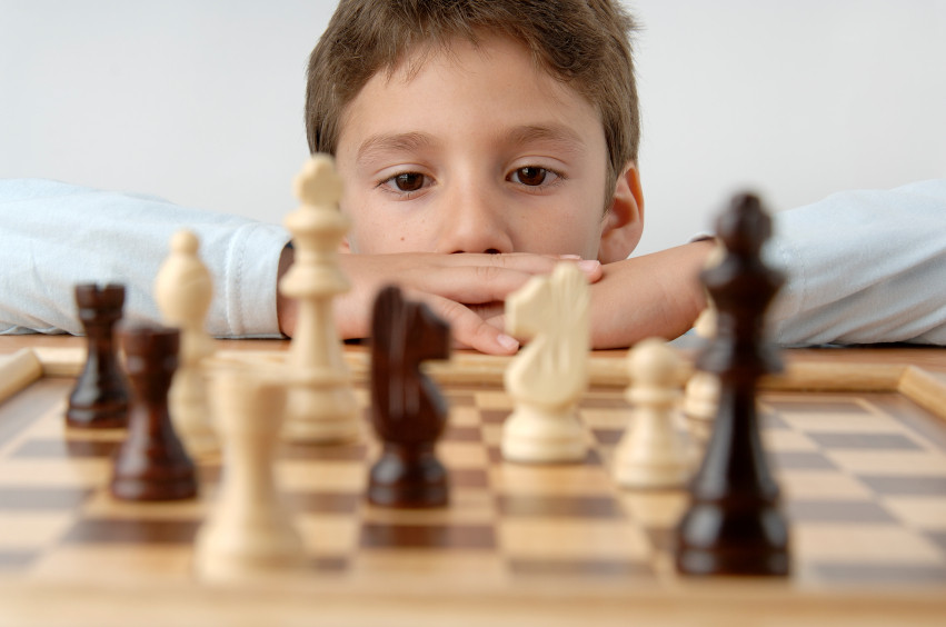 Boy playing chess